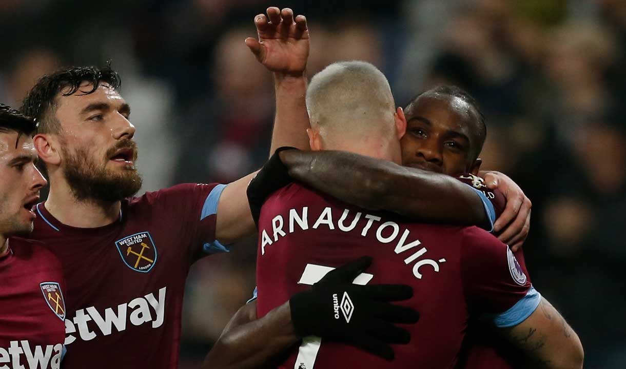 Michail Antonio celebrates with Marko Arnautovic