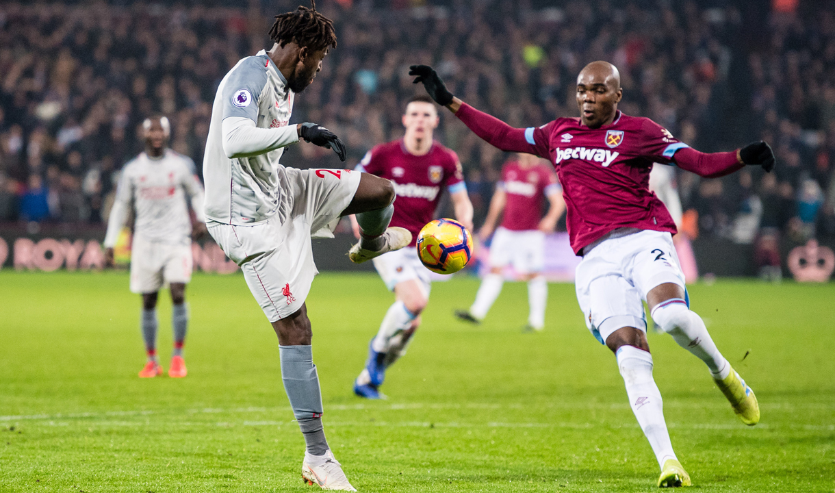 Angelo Ogbonna goes to block from Divock Origi