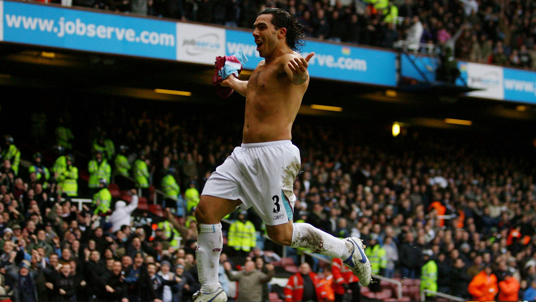 Carlos Tevez celebrates scoring against Tottenham Hotspur