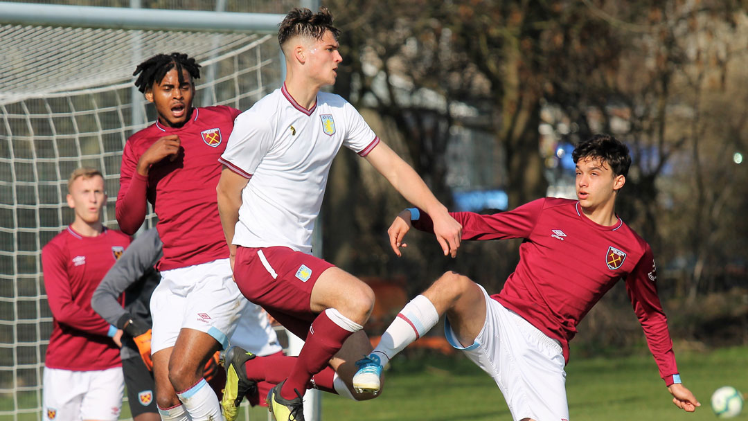 Josh Okotcha and Bernardo Rosa in action against Aston Villa