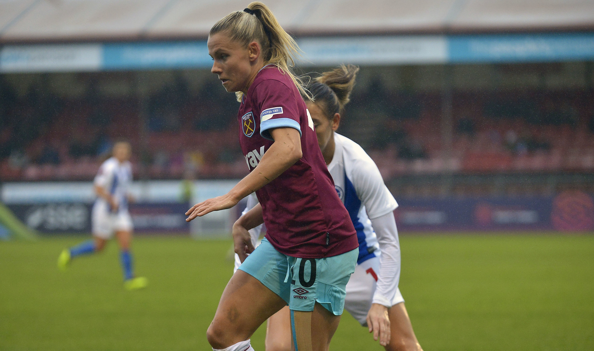 West Ham United midfielder Julia Simic controls the ball.