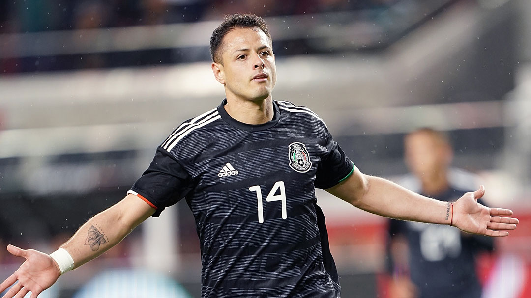 Chicharito celebrates scoring against Paraguay