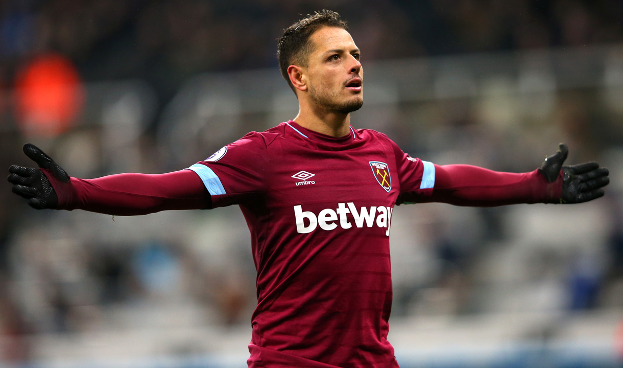 Chicharito celebrates scoring a goal