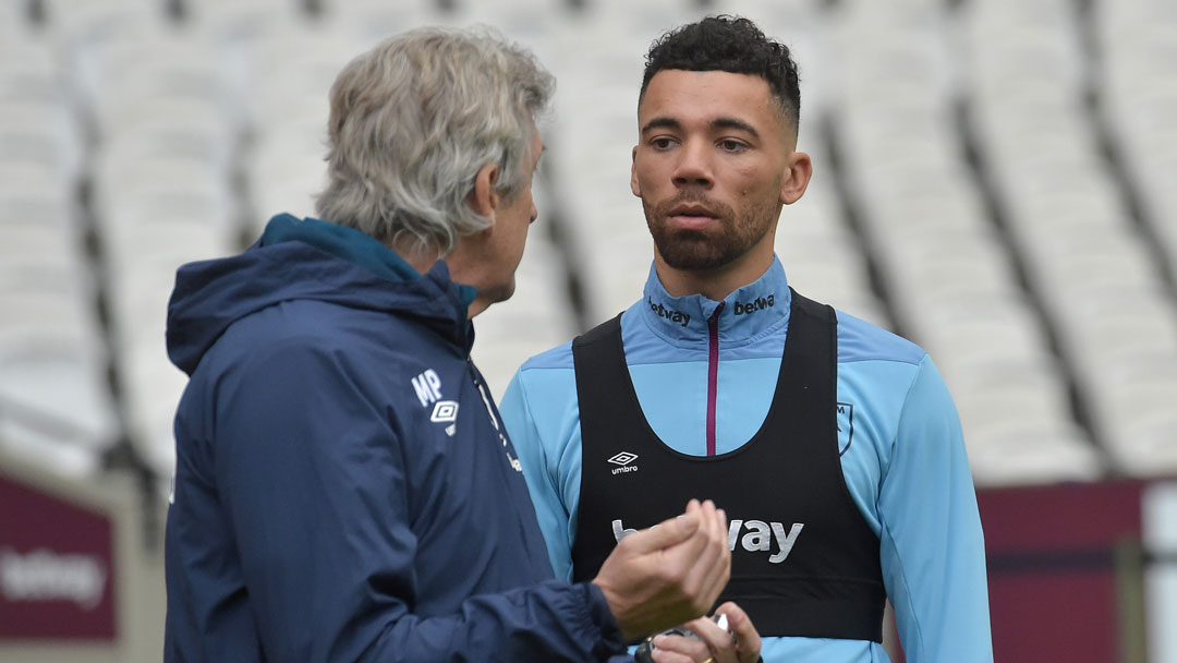 Manuel Pellegrini talks to Ryan Fredericks