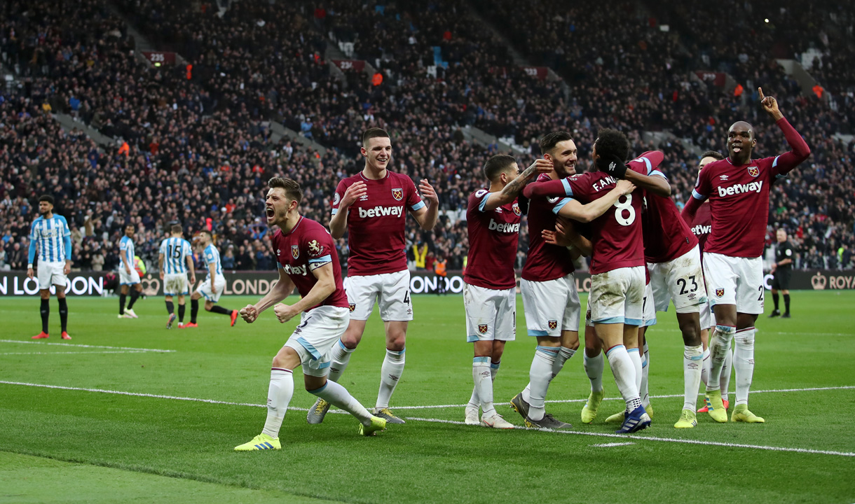 The Hammers celebrate their winner against Huddersfield