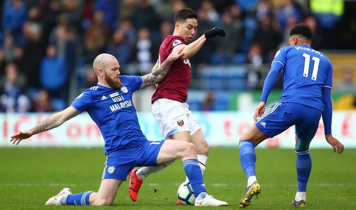 Samir Nasri fights for possession