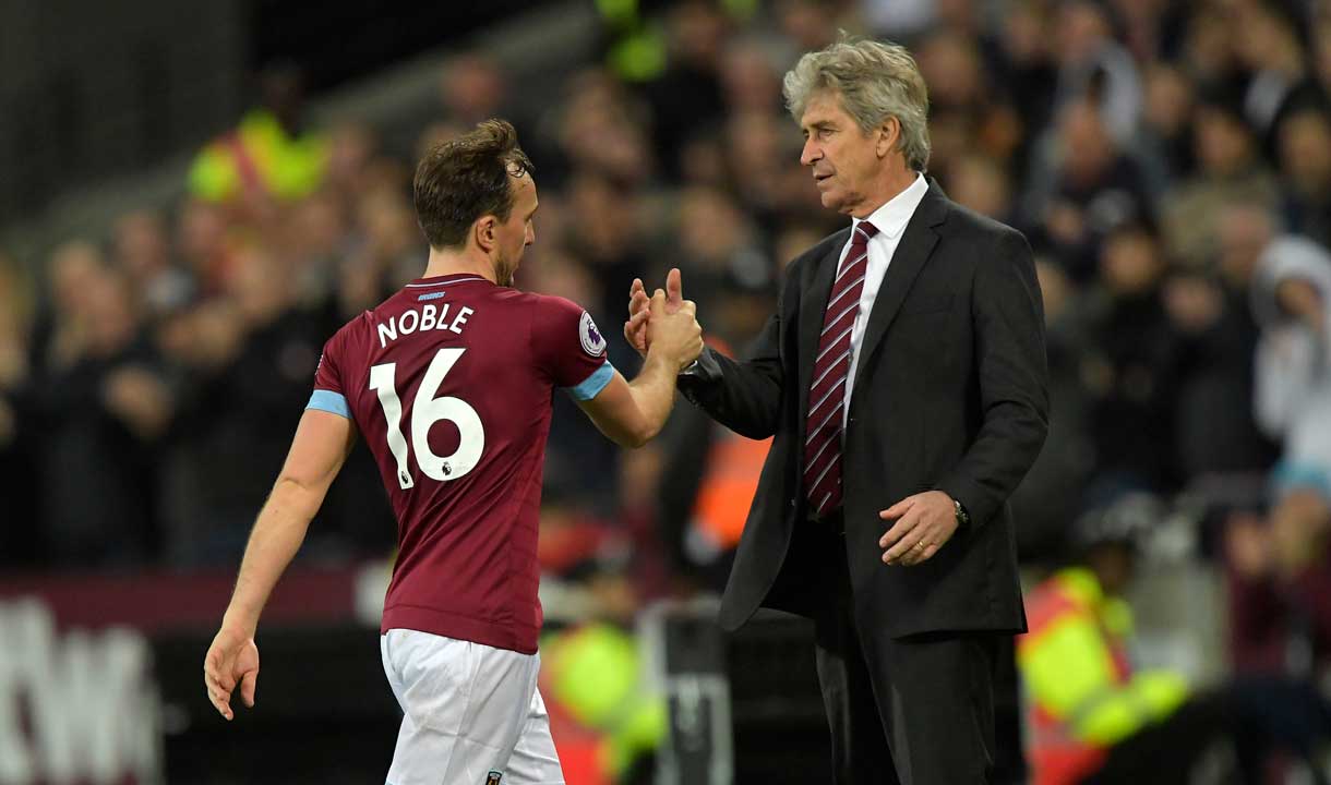 Manuel Pallegrini congratulates Mark Noble