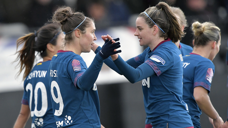 Ross celebrates with her teammates