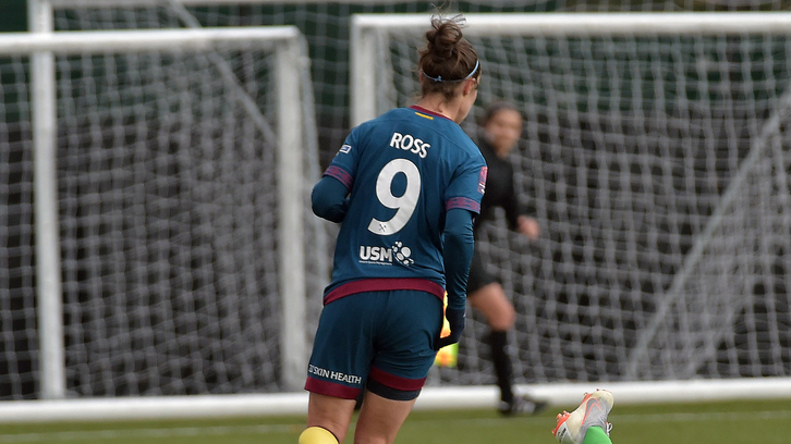 Ross celebrates with her teammates