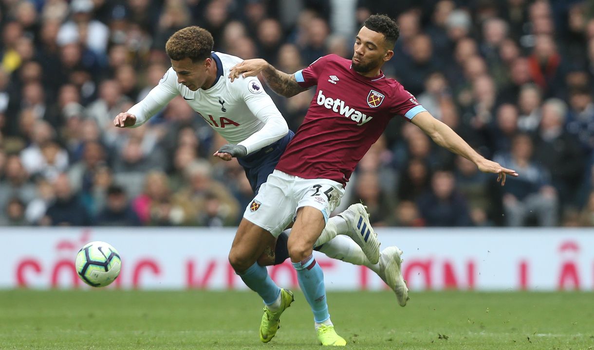 Ryan Fredericks challenges Dele Alli