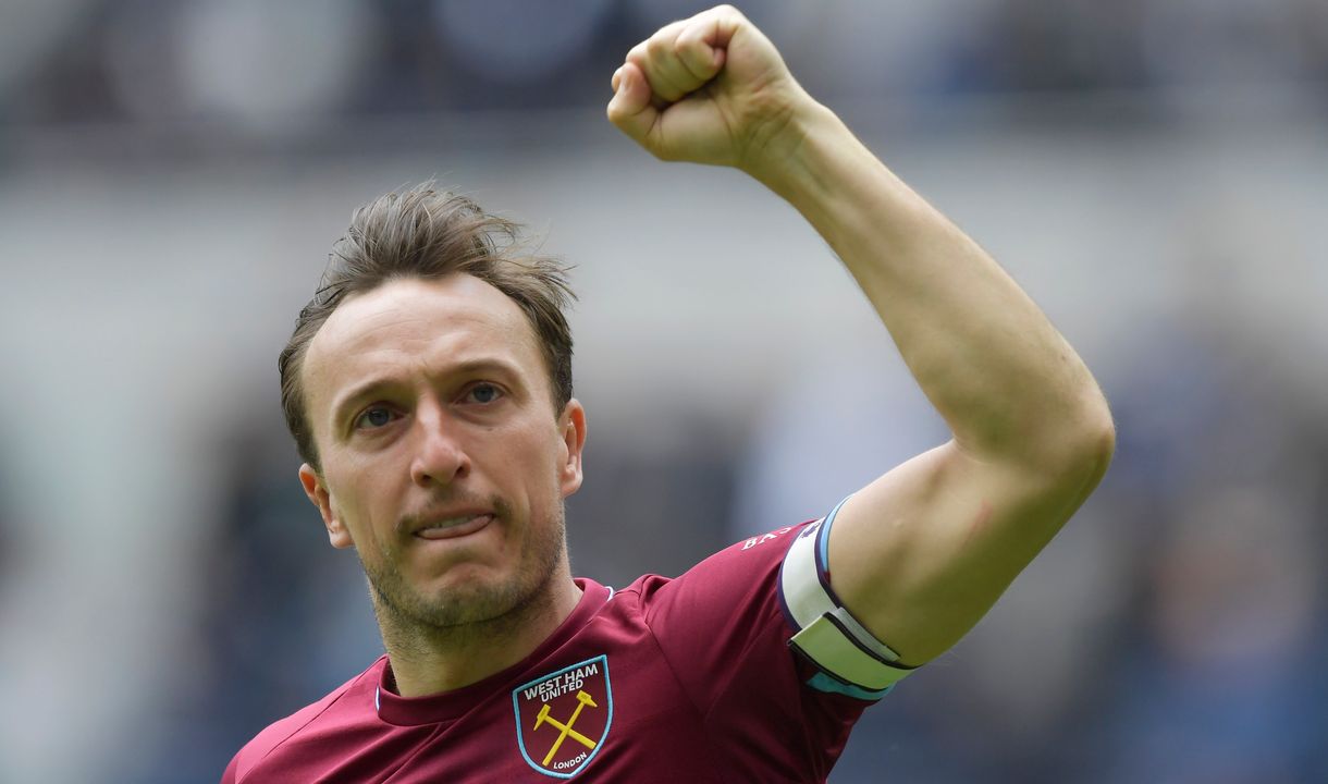 Mark Noble celebrates victory at Tottenham