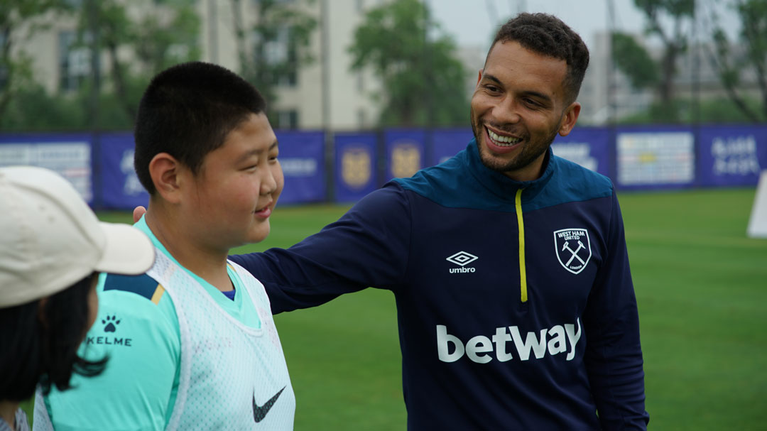 Academy coach Lauris Coggin spreading the West Ham way in China