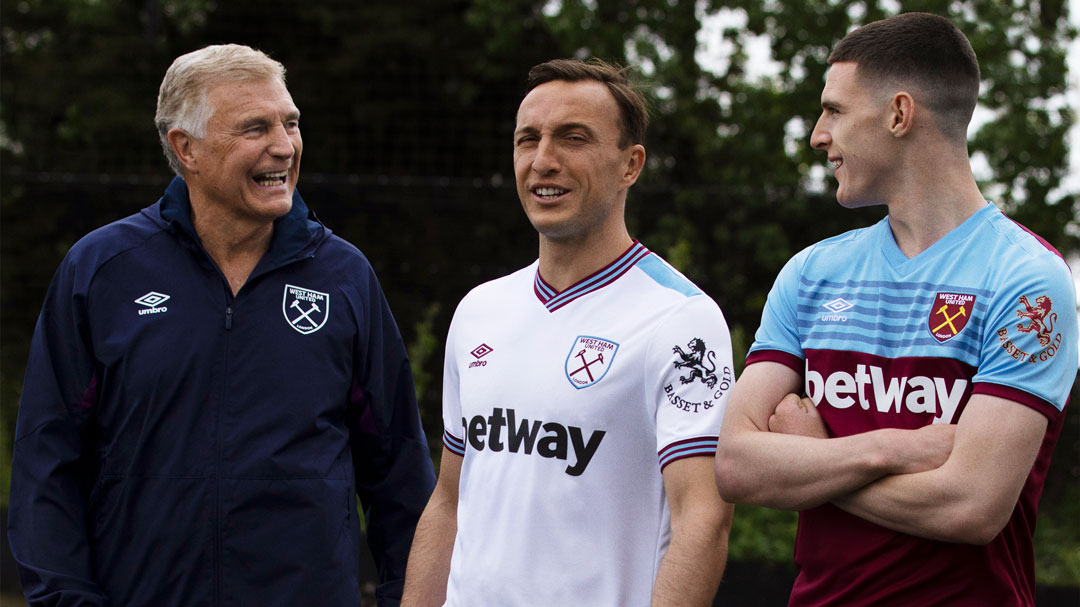 Sir Trevor Brooking, Mark Noble and Declan Rice in the 2019/20 kit