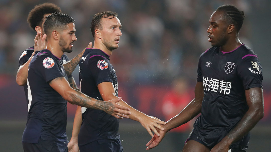 Michail Antonio congratulates Mark Noble on his goal