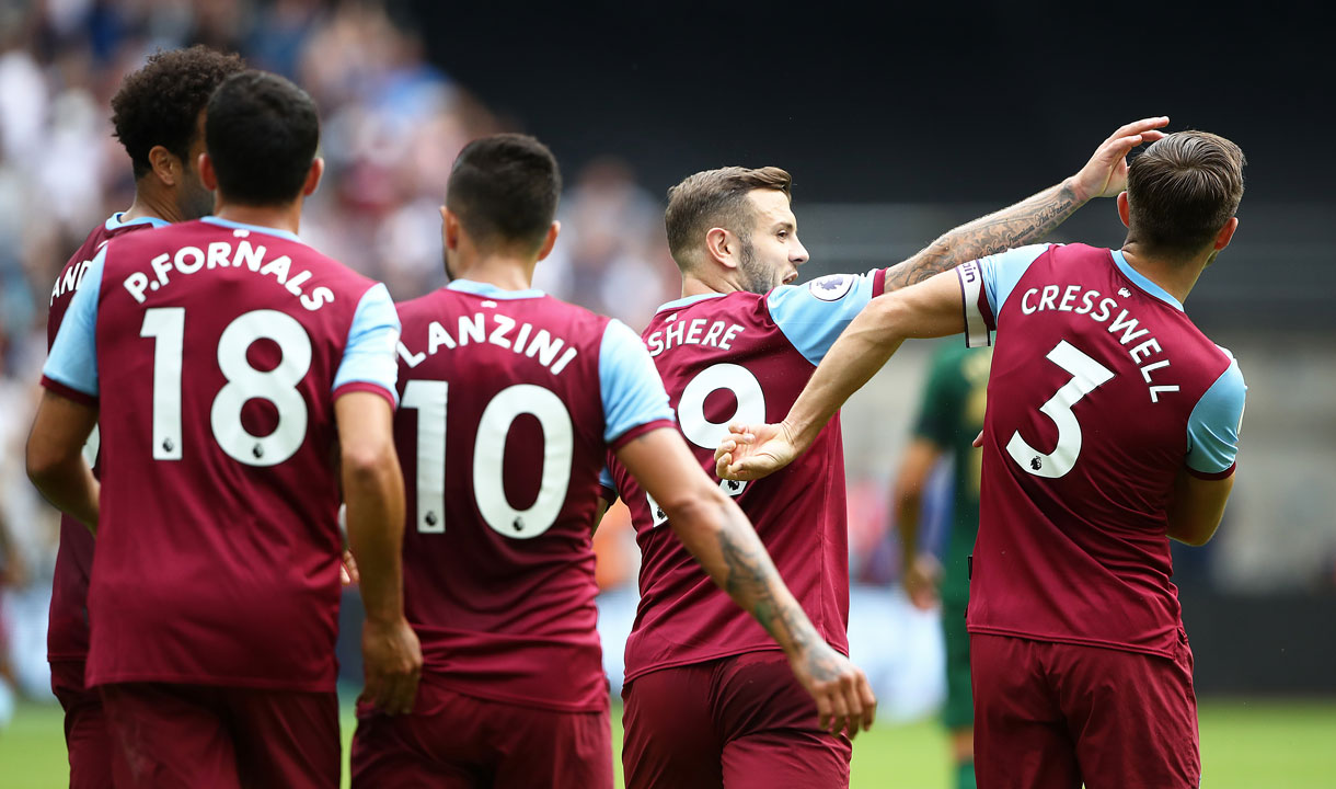 The Hammers celebrate scoring against Athletic Club