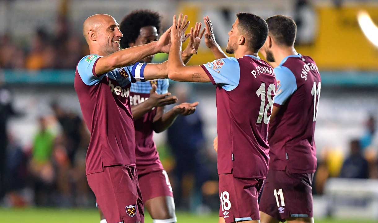 The Hammers celebrate their second goal at Newport