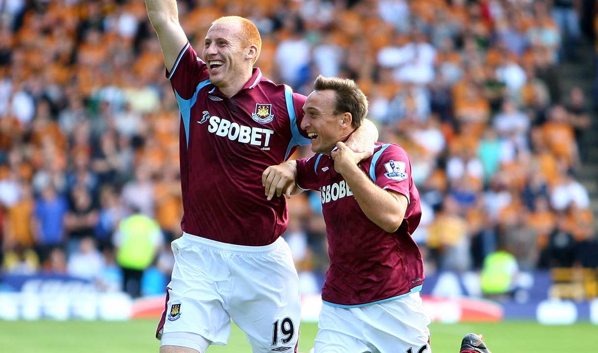 Mark Noble celebrates his goal at Wolves with James Collins