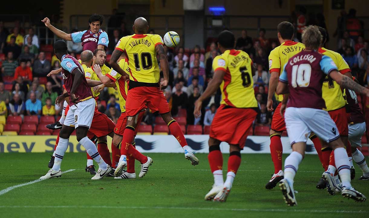 James Tomkins heads the ball against Watford