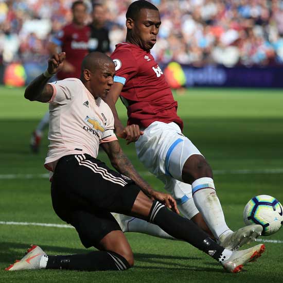 Issa Diop challenges Ashley Young