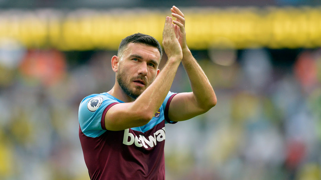 Robert Snodgrass applauds the West Ham fans