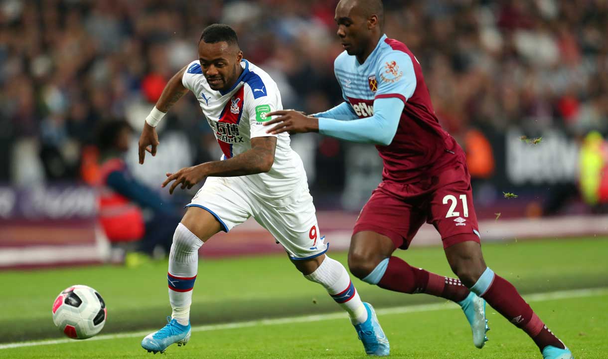 Angelo Ogbonna chases Jordan Ayew