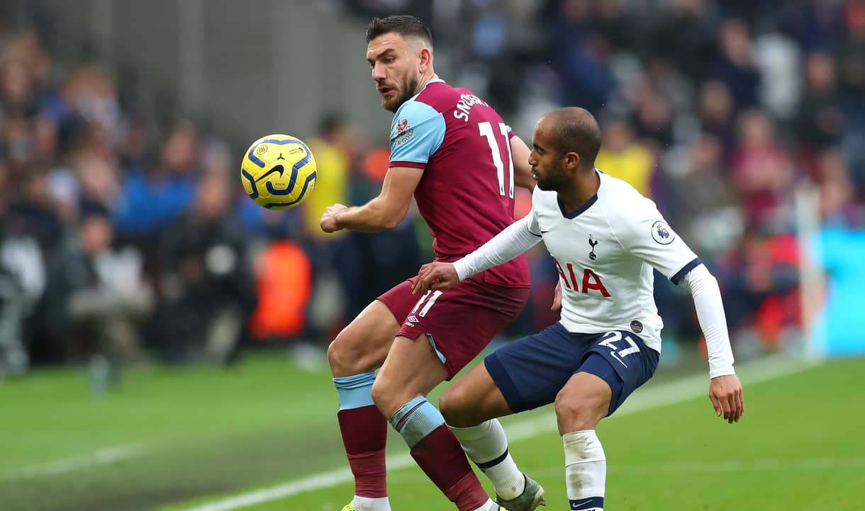 Robert Snodgrass holds off Lucas Moura