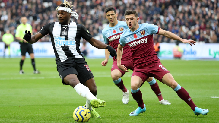 Saint-Maximin of Newcastle takes on Aaron Cresswell