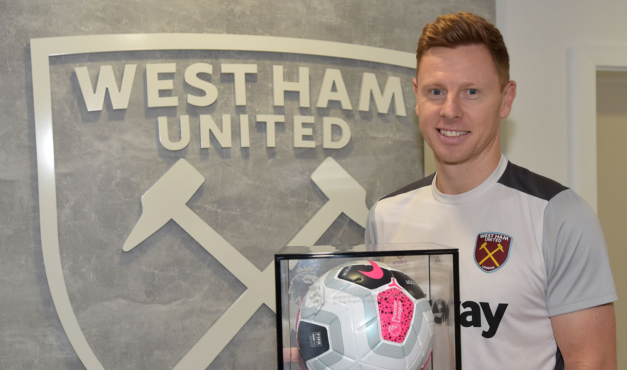 David Martin with his Premier League debut ball