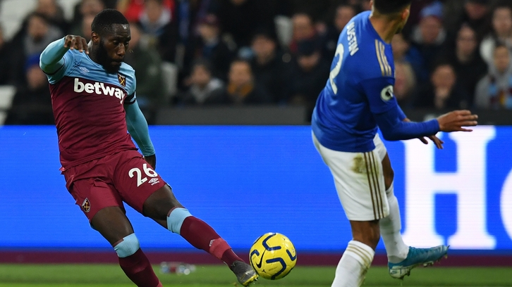 Arthur Masuaku strikes the ball against Leicester City