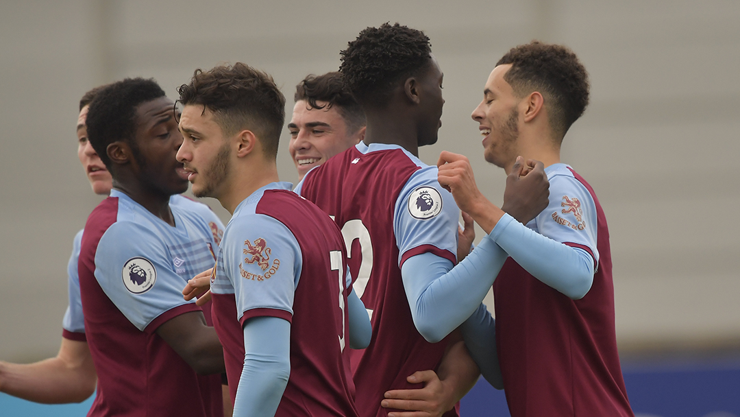 Emmanuel Longelo (No12) congratulates Nathan Holland