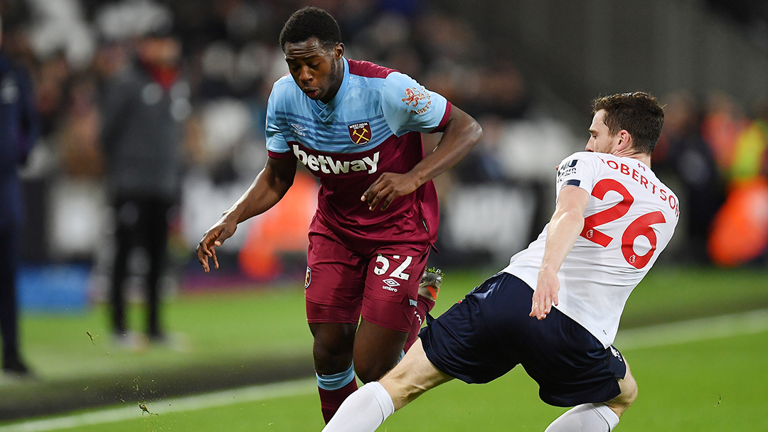 West Ham United's Jeremy Ngakia takes on Liverpool's Andy Robertson