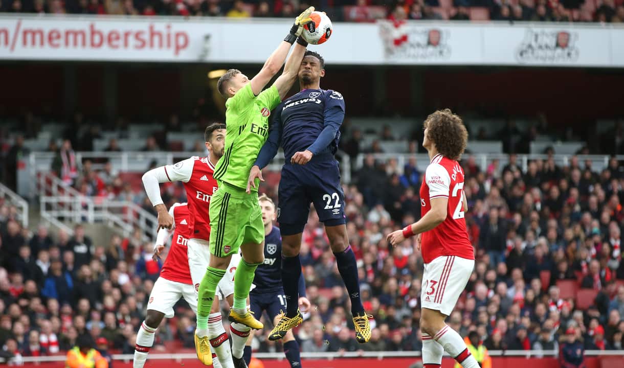 Sebastien Haller challenges Bernd Leno