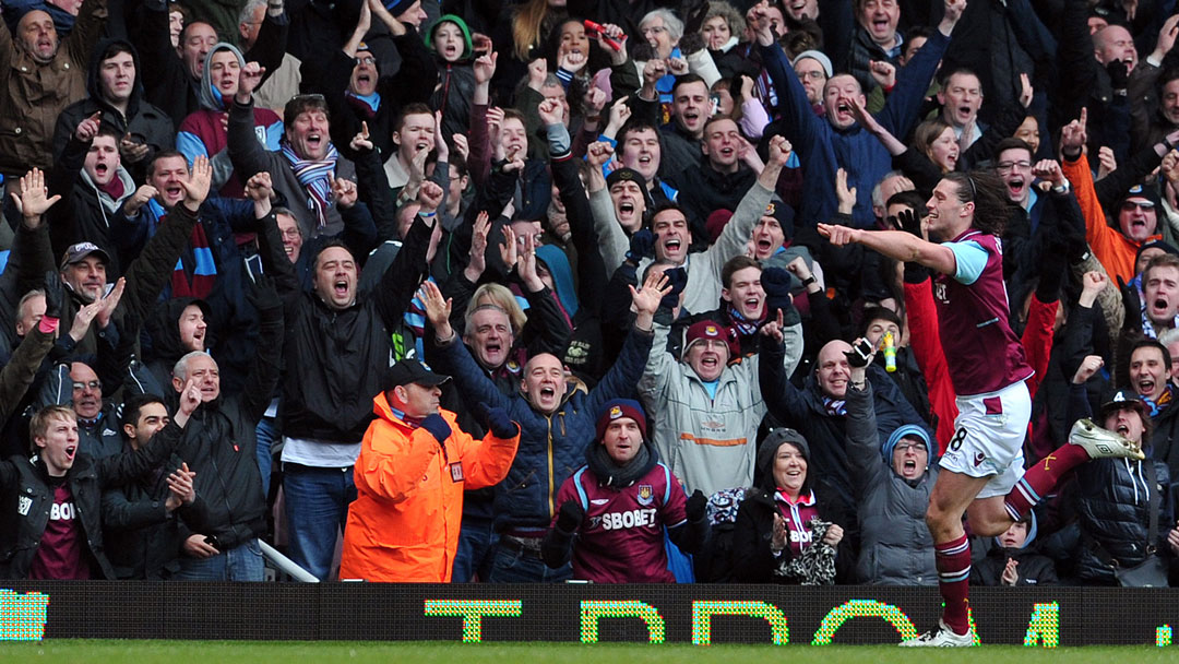 Andy Carroll celebrates scoring against West Brom in March 2013