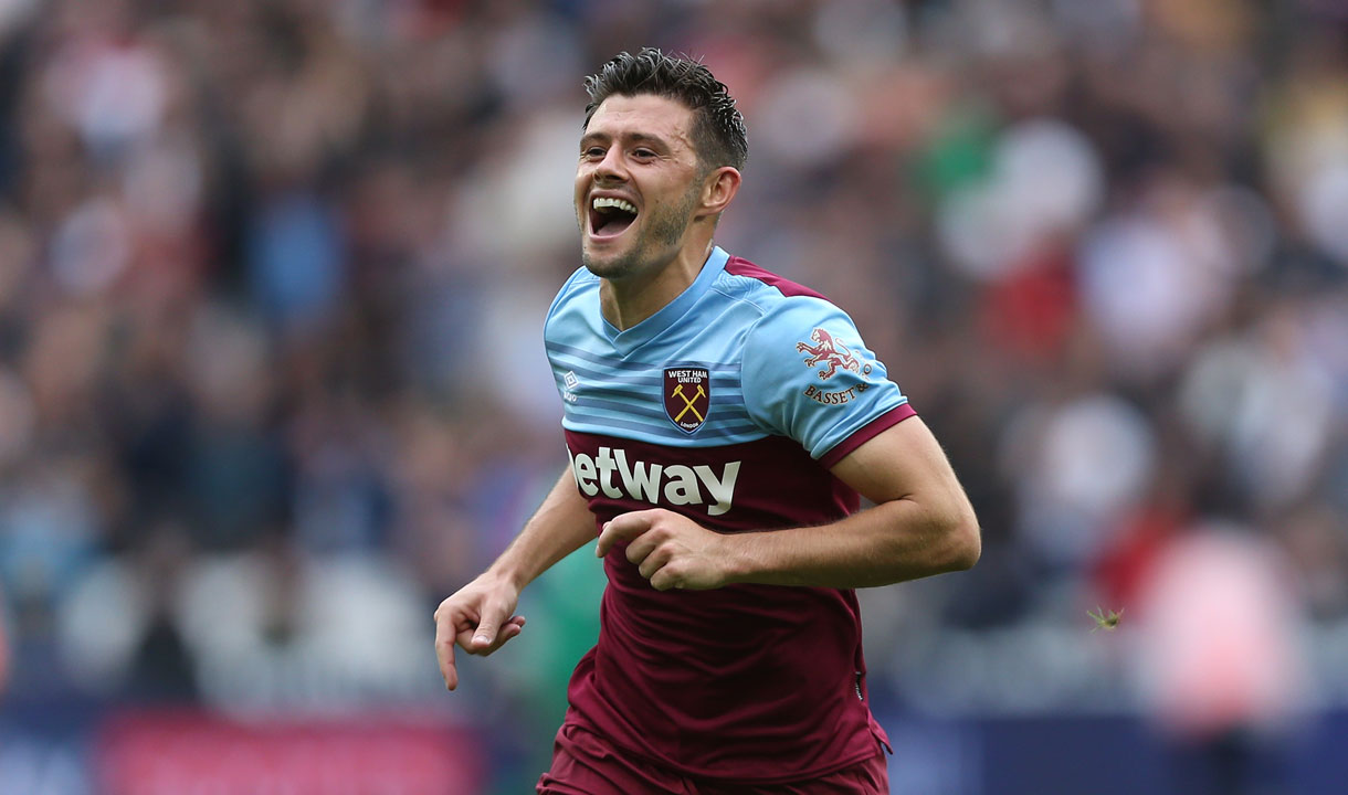 Aaron Cresswell celebrates scoring against Manchester United