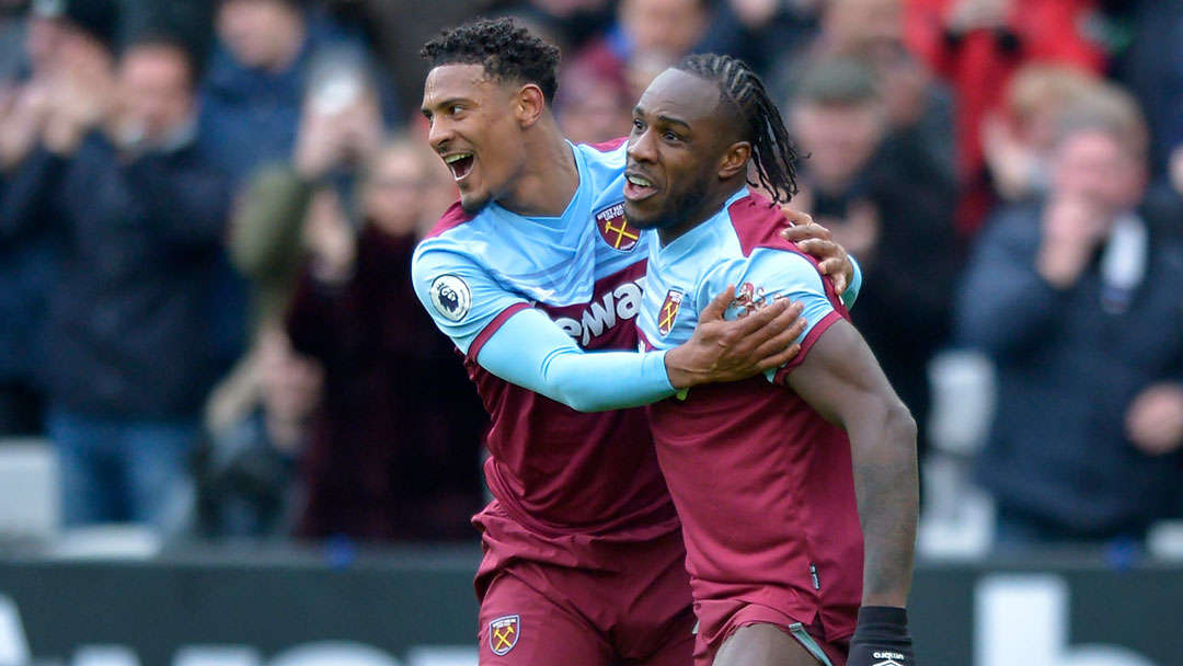 Seb Haller and Michail Antonio celebrate