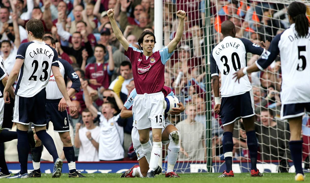 Yossi Benayoun celebrates scoring against Tottenham