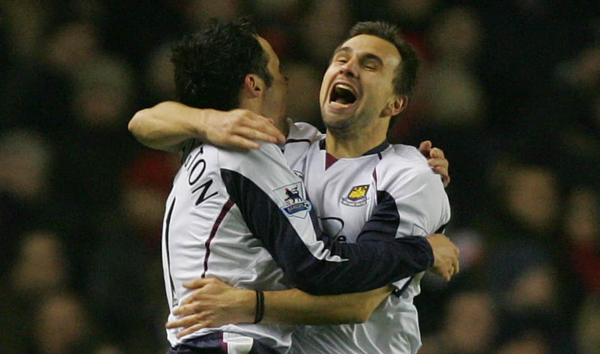 Matthew Etherington and Carl Fletcher celebrate a goal at Arsenal