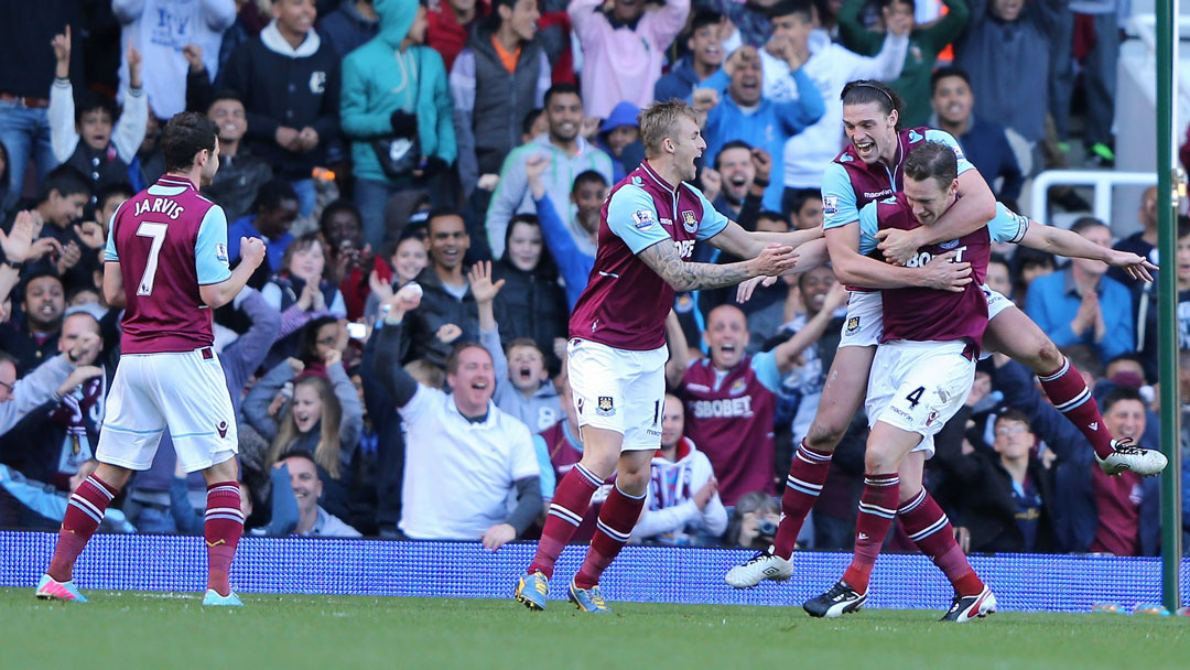 Kevin Nolan celebrates scoring against Wigan in April 2013