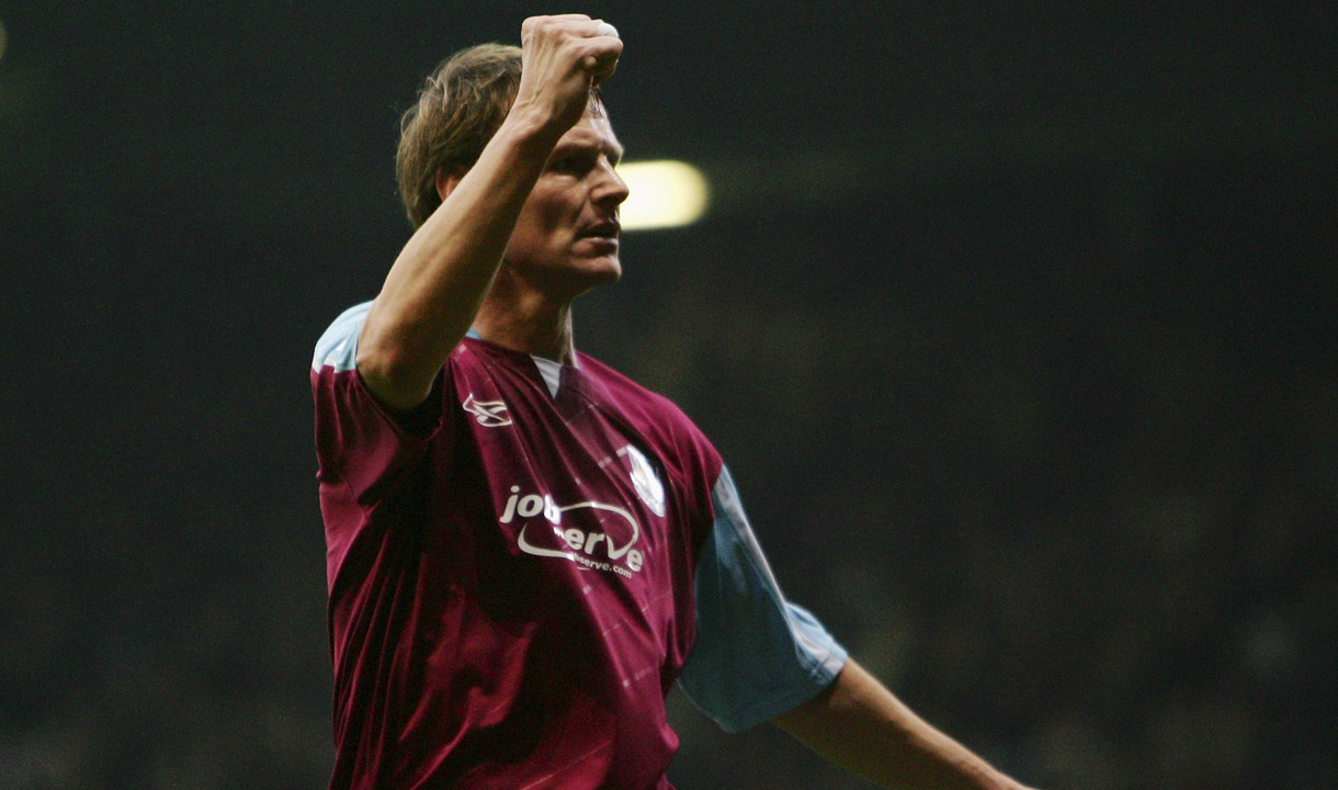 Teddy Sheringham celebrates