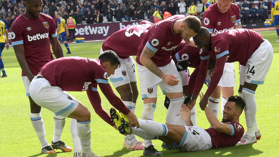 Ryan Fredericks celebrates his goal