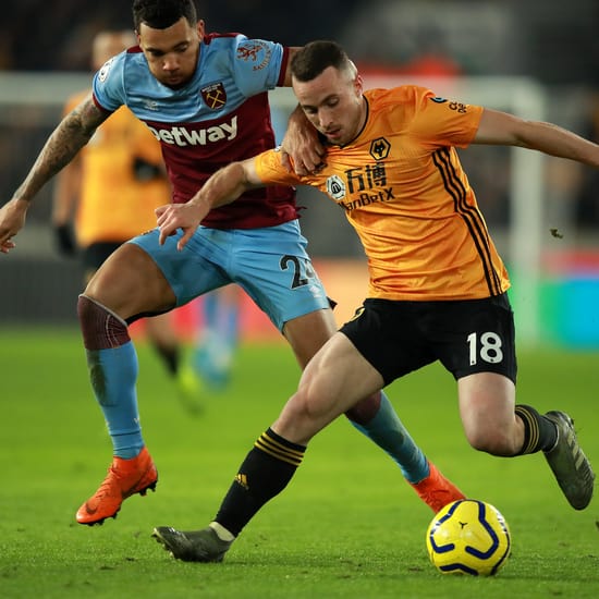 Ryan Fredericks challenges Diogo Jota