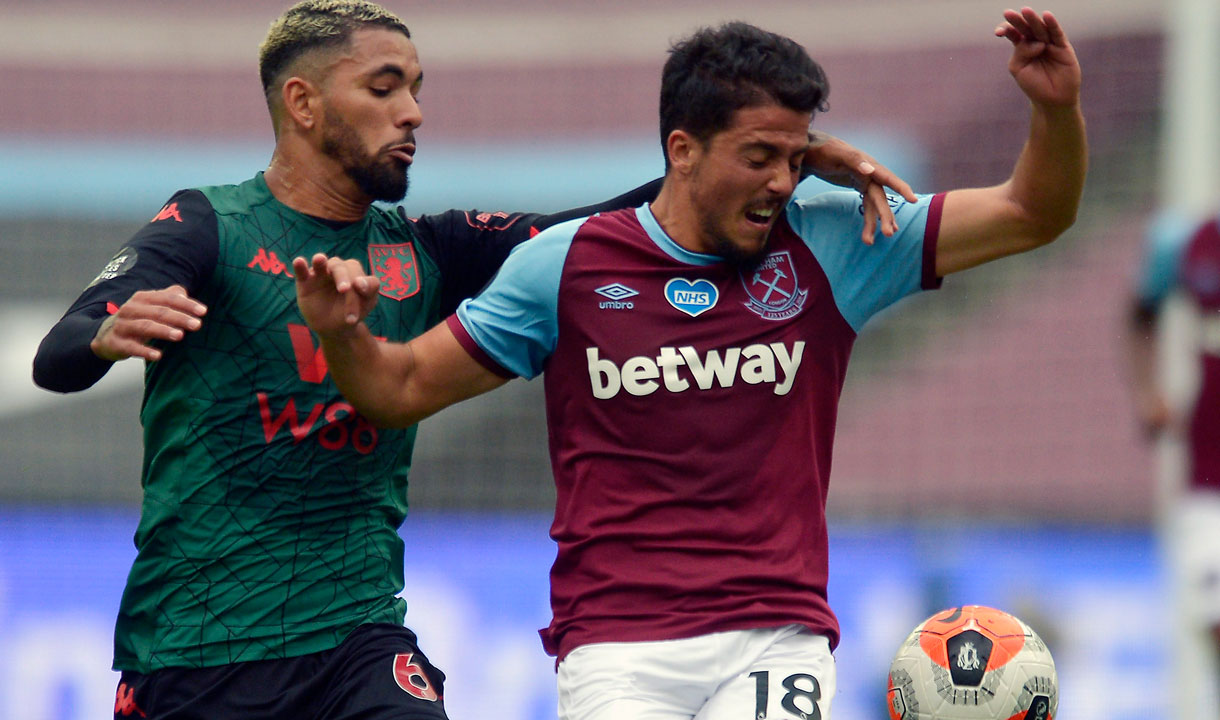 Pablo Fornals battles with Aston Villa's Douglas Luiz