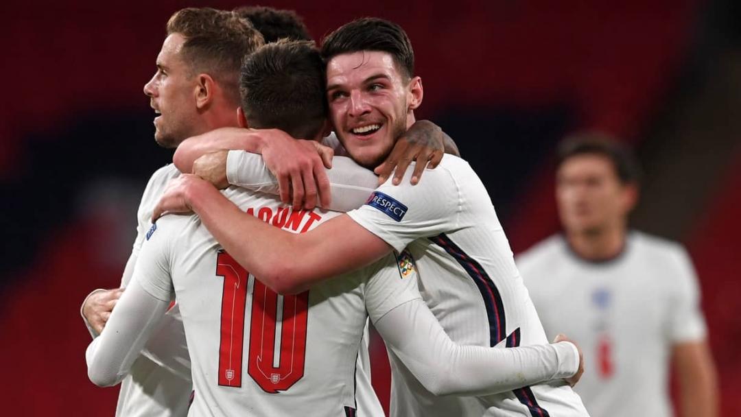 Declan Rice celebrates Mason Mount's winner against Belgium