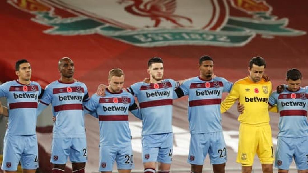 West Ham observe a minute's silence at Anfield