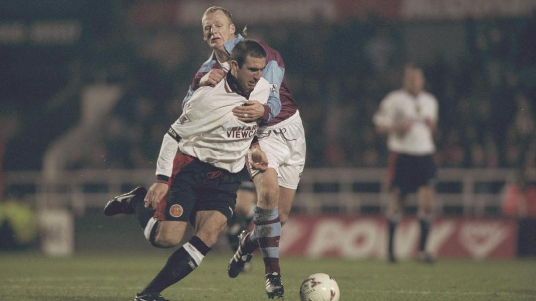 Iain Dowie battles with Eric Cantona