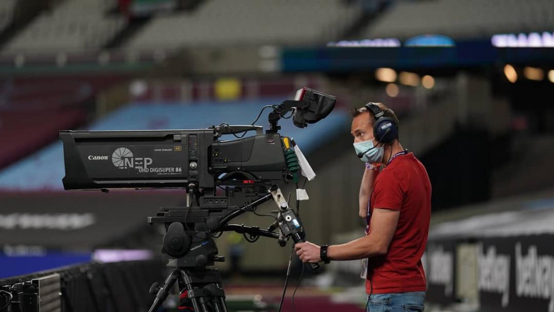 A TV cameraman at London Stadium