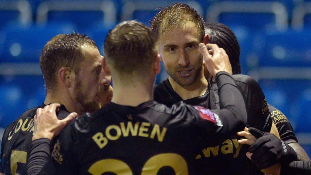 The Hammers celebrate Craig Dawson's goal at Stockport