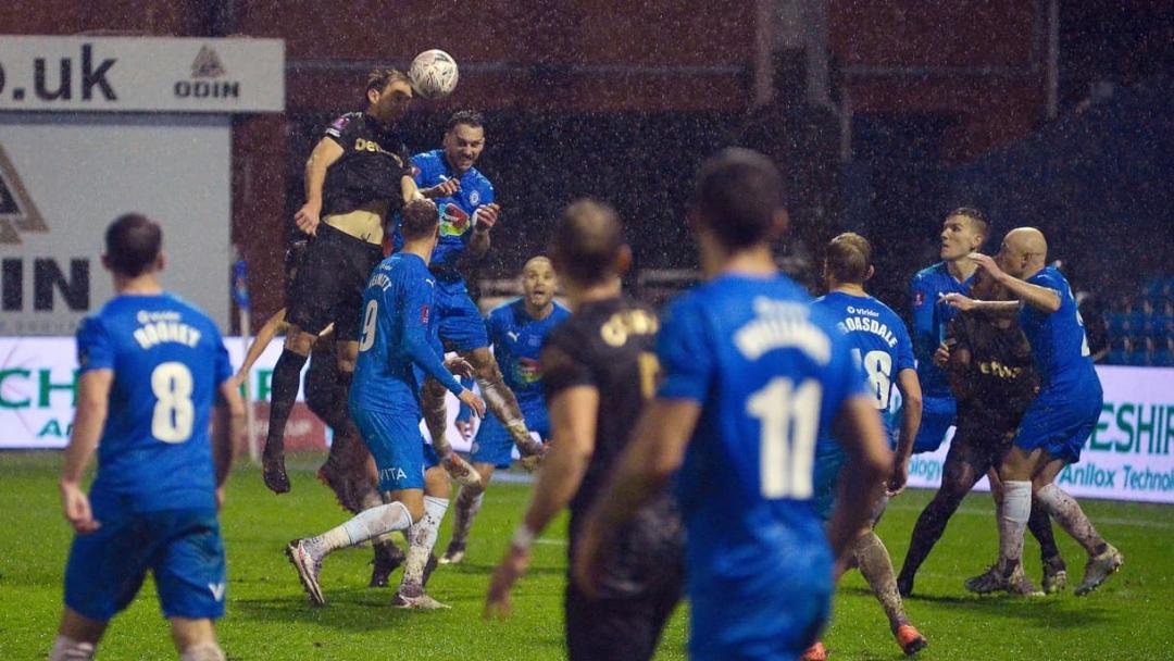 Craig Dawson scores at Stockport