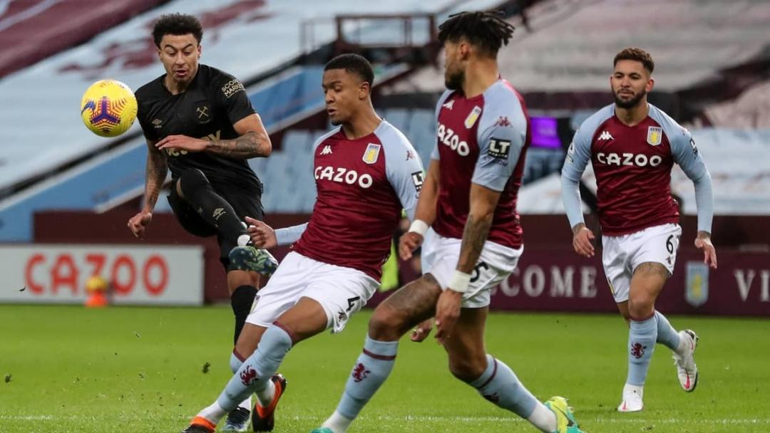 Jesse Lingard shoots at Villa