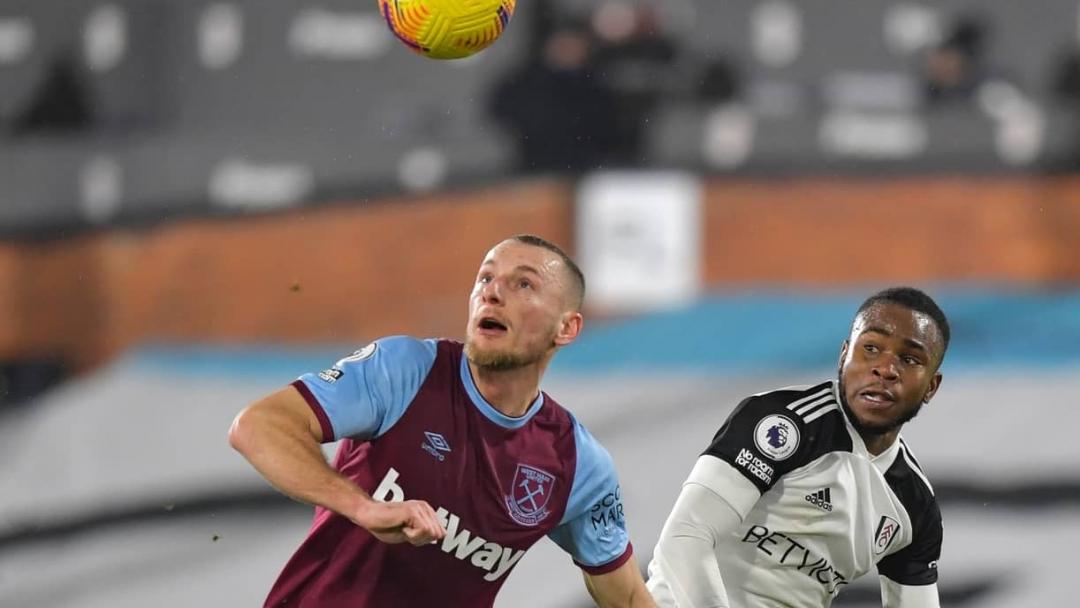 Vladimir Coufal challenges for a header